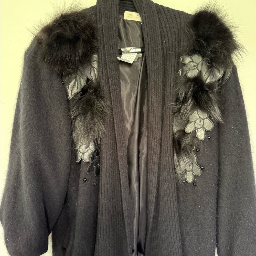 Elegant Black Sweater with Faux Fur Accents